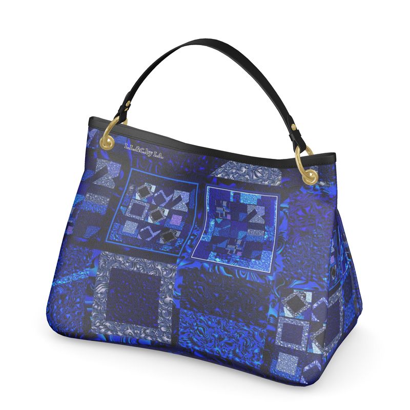 Borsa in pelle  a mano linea Ricami